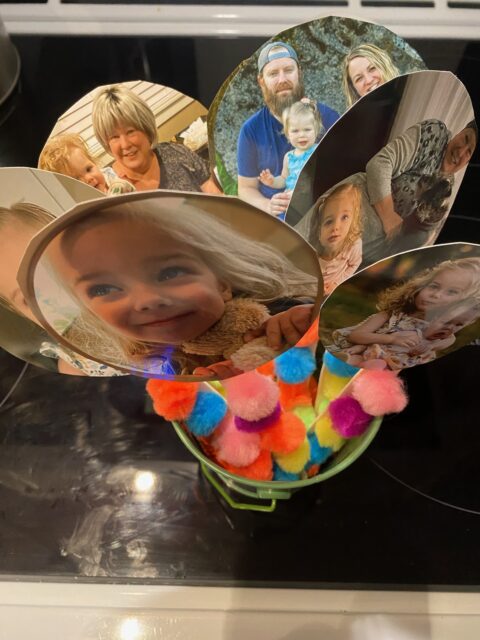 Mya and Morgan's Mother's Day present to Grandma. A bouquet of pictures with colorful fuzzy dots.