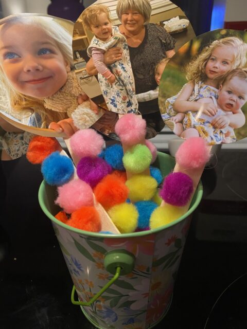Mya and Morgan's Mother's Day present to Grandma. A bouquet of pictures with colorful fuzzy dots.